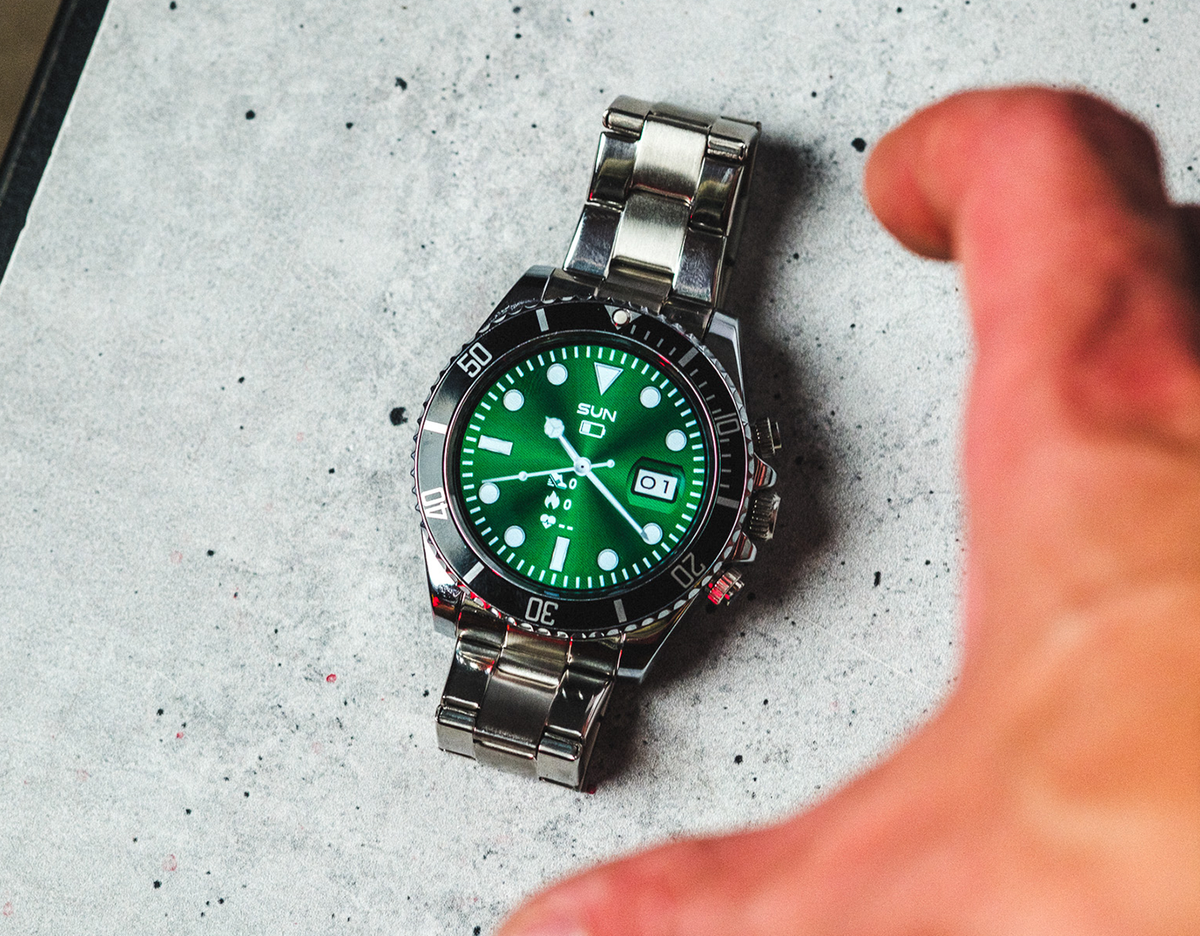 Man outdoors, Nexus Pro smartwatch on wrist
